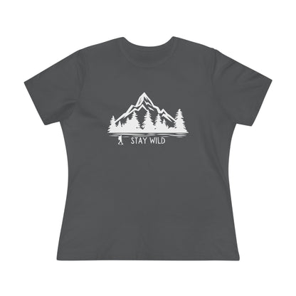 Charcoal t-shirt with white mountain and tree graphic and 'Stay Wild' text on a white background