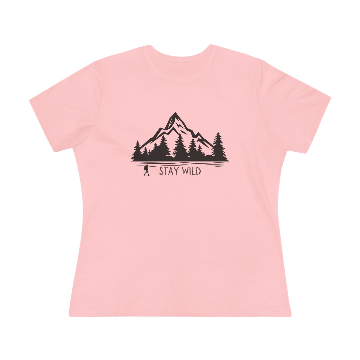 Pink t-shirt with a mountain and trees graphic and 'Stay Wild' text on a white background