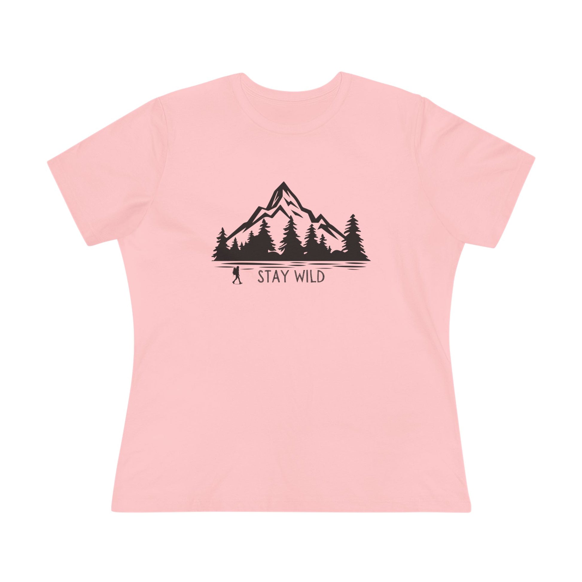 Pink t-shirt with a mountain and trees graphic and 'Stay Wild' text on a white background